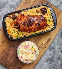 Ghana Coconut Rice, salad, and chicken